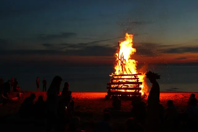 Go Holidays Midsummer celebration on the seaside with a huge bonfire